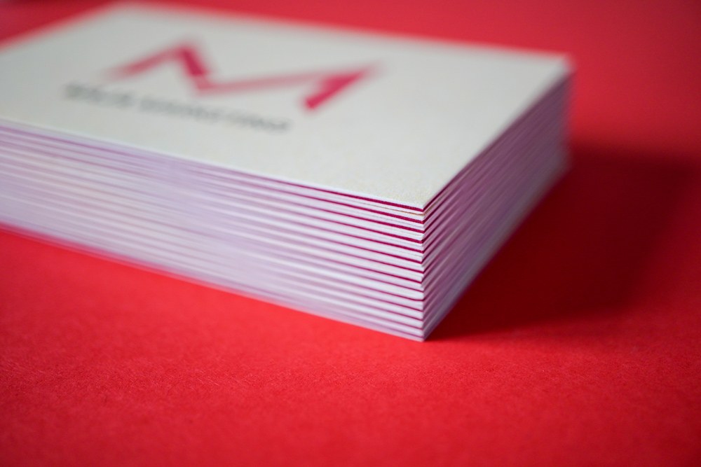 Brand Identity Design For Maja Sinkovec Performance Marketing, By Corliss-design, Business Cards On A Pile