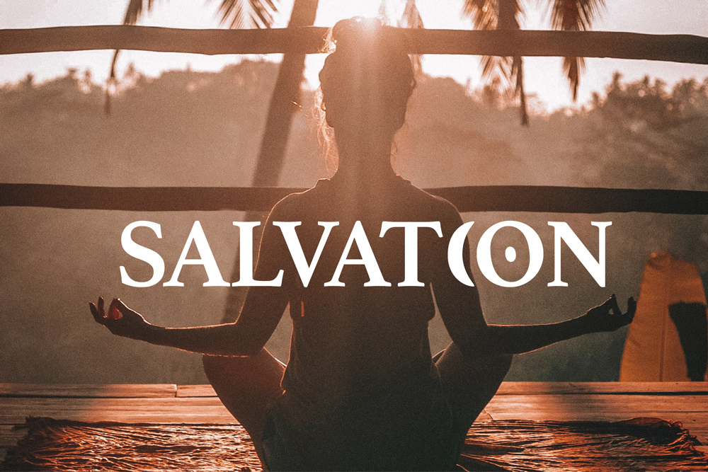 Salvation Logo On A Picture Of A Woman Meditating