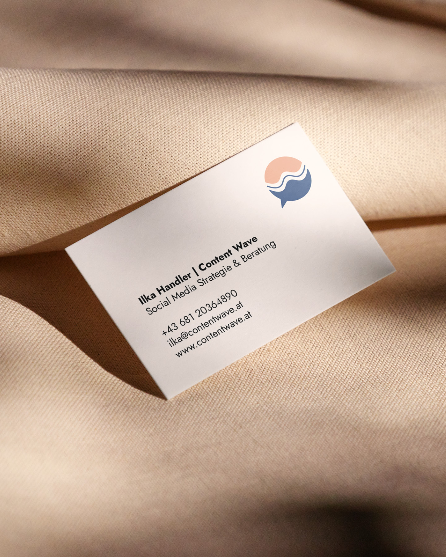 mockup of content wave's business cards by corliss design