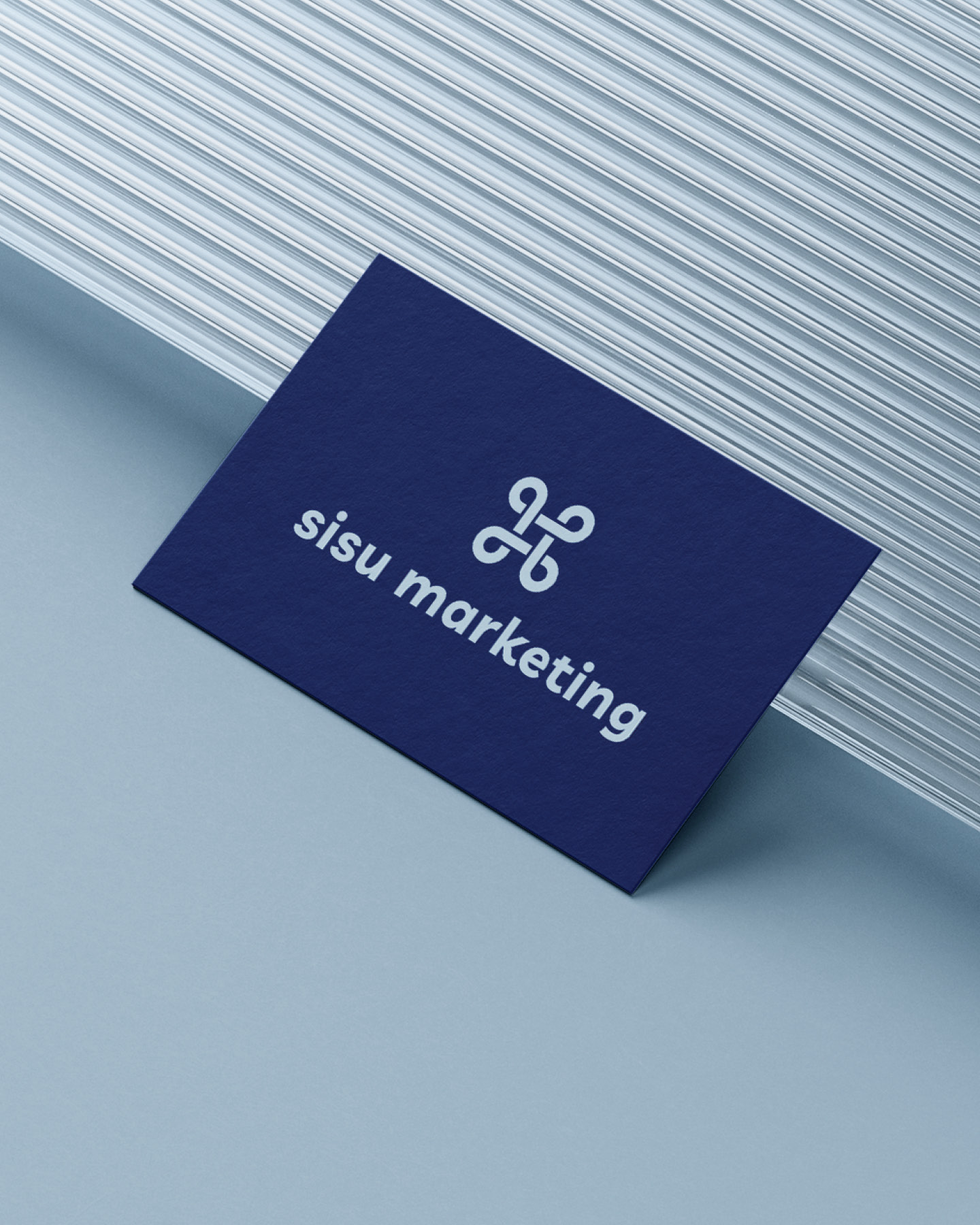 mockup of sisu marketing's business cards by corliss design