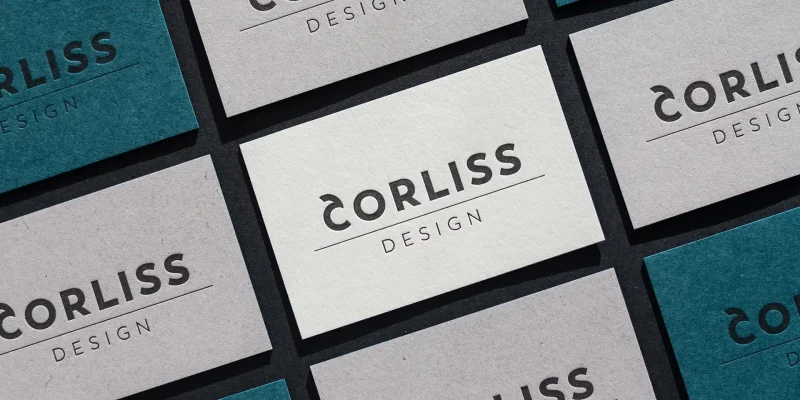 Brand Design von und für Corliss Design, zu sehen sind Visitenkarten mit Letterpress